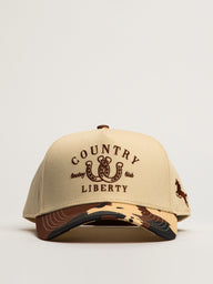 COUNTRY LIBERTY LUCKY YOU HAT - COW PRINT