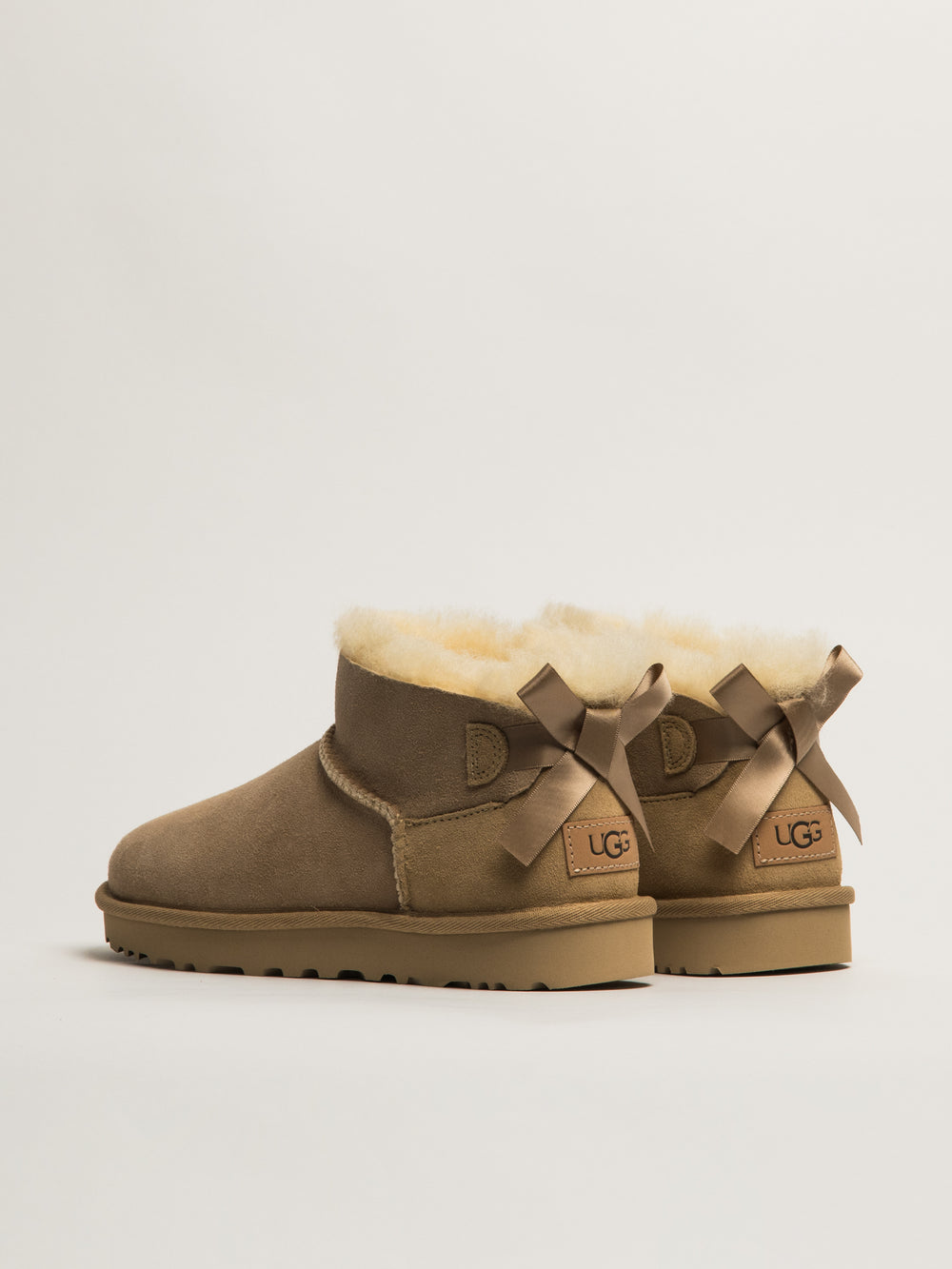 UGG ULTRA MINI BAILEY BOW BOOT - SAND